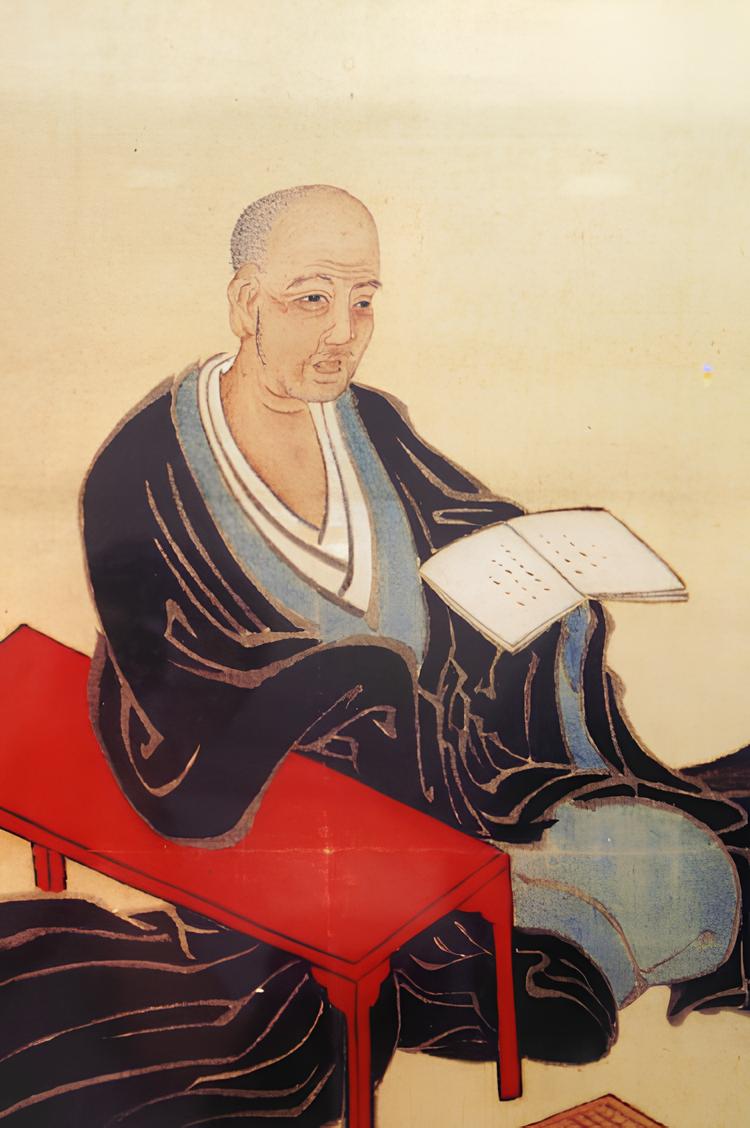 Full-body illustration of Honinbo Dosaku reading, seated beside a red bench