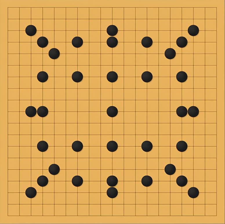 Black stones arranged in an abstract go formation on a wooden board