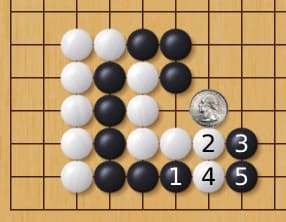 Go board corner diagram with a coin next to the stones and numbered black moves (1–5) marking possible follow-up points.