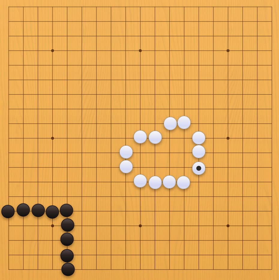 Diagram of a Go board showing black and white stones enclosing different areas to illustrate territory counting and komi.