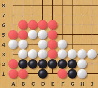 Go board showing a position influenced by a coin acting as a neutral wall in the Coin Go variant