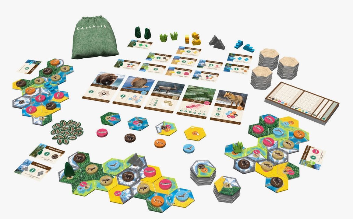 The game components from the Cascadia Landmarks expansion, including tiles, cards, and tokens, neatly arranged on a table.