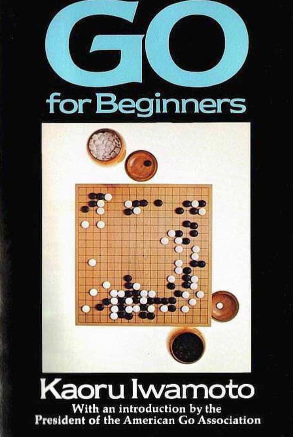 Cover of 'Go for Beginners' by Kaoru Iwamoto, featuring a Go board and traditional wooden bowls.