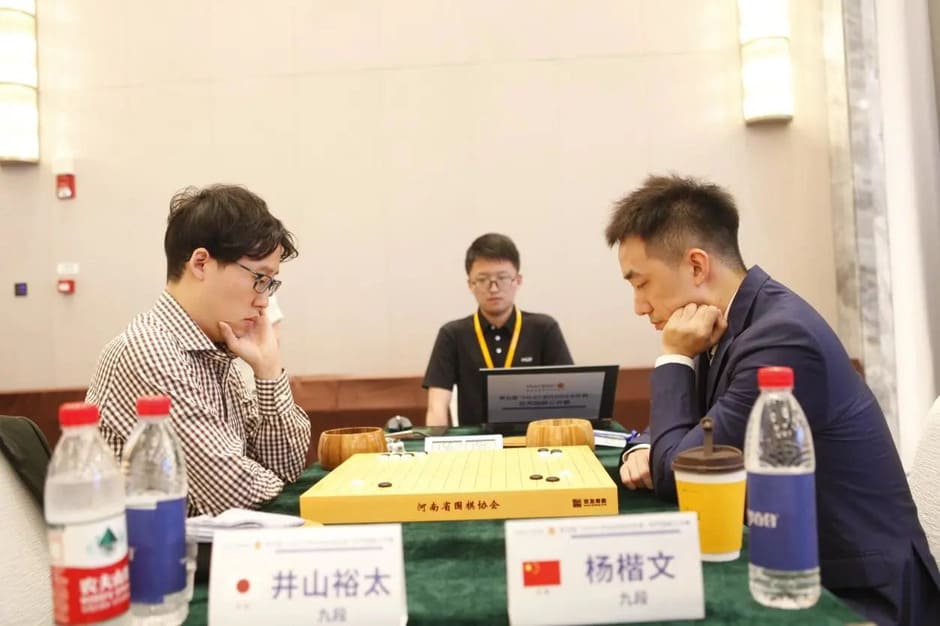 Iyama Yuta focused during a match against Chinese player Yang Dingxin in an international Go tournament