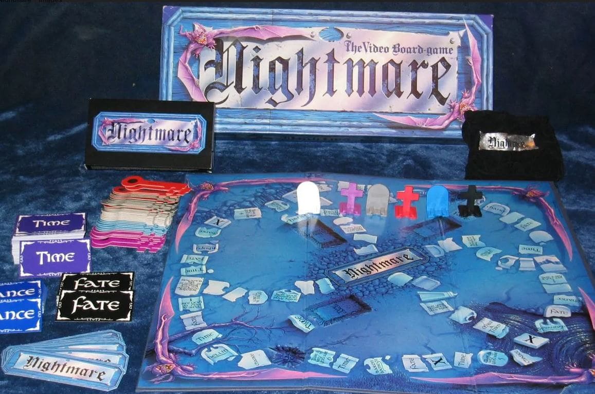 A spooky Nightmare board game layout with themed cards and pieces, featuring keys, time cards, and tombstone player markers on a dark blue game board.