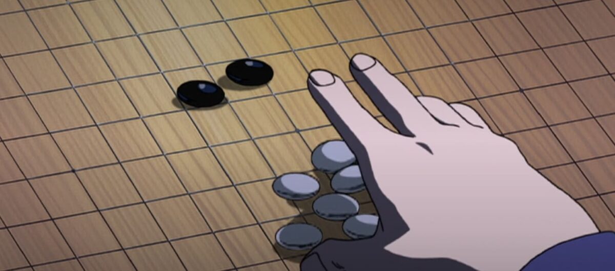 A close-up animated scene of a hand placing white Go stones during a pivotal moment in a Go game.