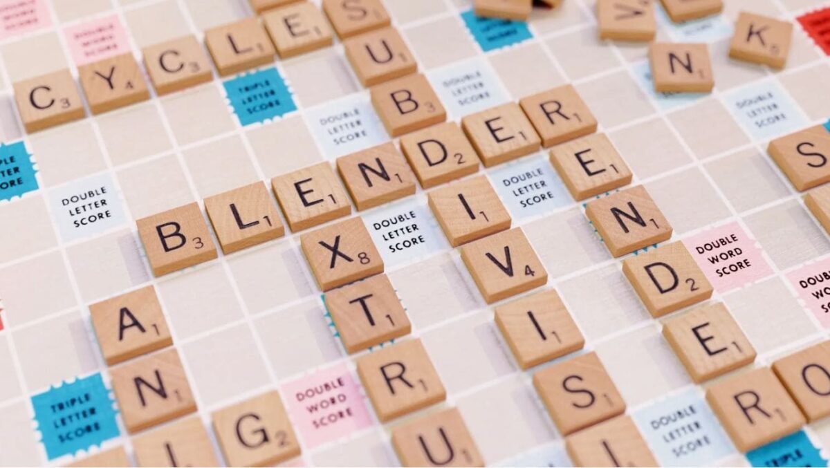 A Scrabble board featuring tiles that spell out words like "Blender" and "Extrude.