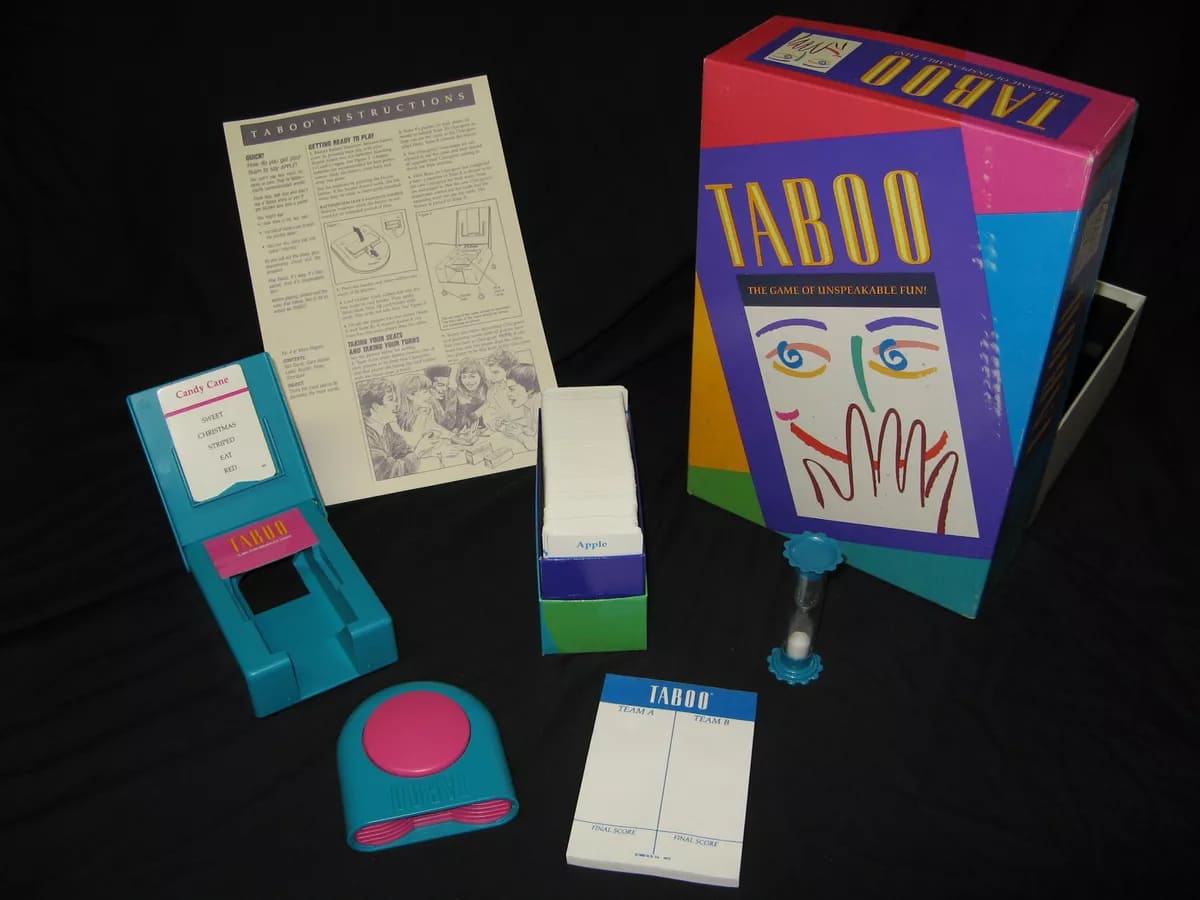 The Taboo board game from the 80s, complete with a buzzer, timer, and cards for word guessing.