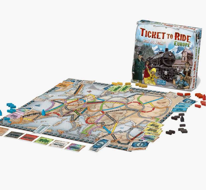 A Ticket to Ride: Europe board game setup with a map of Europe and various game pieces and cards.